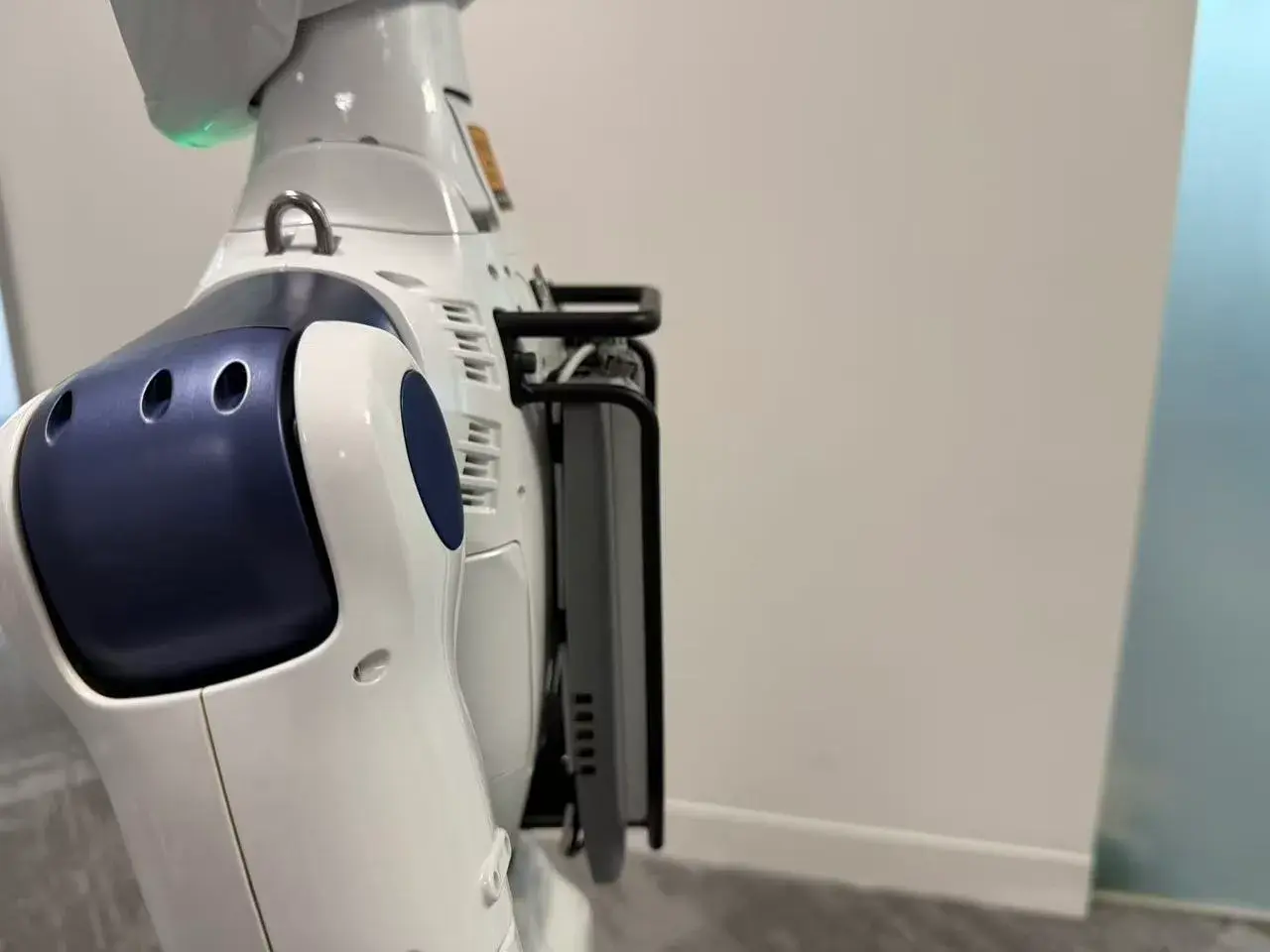 The Xmind unit mounted on the back of a RobotX humanoid robot.